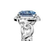 Halo Engagement Ring Setting for Fancy Blue Radiant Cut Center with Open Scroll Shoulders and Prong Head in White Gold