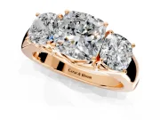 3 Stone Engagement Ring Setting for Cushion Cut Center with Raised Basket Heads and Prong Head in Rose Gold