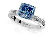 Solitaire Engagement Ring Setting for Fancy Blue Cushion Cut Center with Channel Baguette Band and Prong Head in Platinum