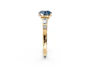 Bar-Set Engagement Ring Setting for Fancy Blue Round Cut Center with Tapered Baguette Accents and Prong Head in Yellow Gold