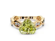 Solitaire Engagement Ring Setting for Fancy Yellow Heart-Shaped Center with Accented Twist Band and Leaf Prong Head in Yellow Gold