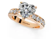 Solitaire Engagement Ring Setting for Heart-Shaped Center with Channel-Set Accents and Prong Head in Rose Gold