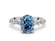 Solitaire Engagement Ring Setting for Fancy Blue Oval Center with Trailing Leaf Accent Band and Prong Head in Platinum