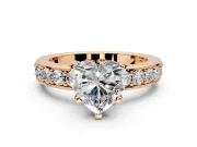 Solitaire Engagement Ring Setting for Heart-Shaped Center with Channel-Set Accents and Prong Head in Rose Gold