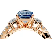 3 Stone Engagement Ring Setting for Fancy Blue Radiant Cut Center with Pave Split Shank and Prong Head in Rose Gold
