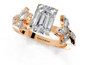 Floral Engagement Ring Setting for Emerald Cut Center with Trailing Marquise Accents and Prong Head in Rose Gold