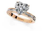Solitaire Engagement Ring Setting for Heart-Shaped Center with Channel Baguette Band and Prong Head in Rose Gold