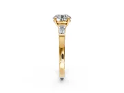 3 Stone Engagement Ring Setting for Round Cut Center with Channel Baguette Accents and Prong Head in Yellow Gold
