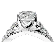Solitaire Engagement Ring Setting for Cushion Cut Center with Graduated Shared Prongs and Prong Head in Platinum