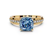 Solitaire Engagement Ring Setting for Fancy Blue Cushion Cut Center with Raised Channel Band and Prong Head in Yellow Gold