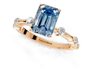 Solitaire Engagement Ring Setting for Fancy Blue Emerald Cut Center with Bezel Station Band and Prong Head in Rose Gold