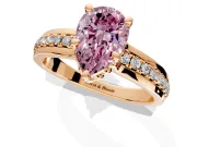 Solitaire Engagement Ring Setting for Fancy Pink Pear-Shaped Center with Raised Channel Band and Prong Head in Rose Gold