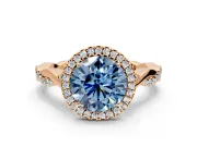 Halo Engagement Ring Setting for Fancy Blue Round Cut Center with Twist Band and Prong Head in Rose Gold
