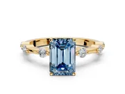 Solitaire Engagement Ring Setting for Fancy Blue Emerald Cut Center with Bezel Station Band and Prong Head in Yellow Gold