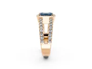 Halo Engagement Ring Setting for Fancy Blue Emerald Cut Center with Wide-Open Pave Split Shank and Prong Head in Rose Gold
