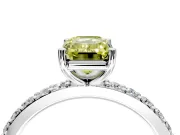 Solitaire Engagement Ring Setting for Fancy Yellow Emerald Cut Center with Round Cut Pave Band and Prong Head in Platinum