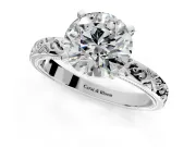 Solitaire Engagement Ring Setting for Round Cut Center with Scrollwork Band and Prong Head in Platinum