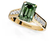 Solitaire Engagement Ring Setting for Fancy Green Emerald Cut Center with Round Cut Channel Band and Prong Head in Yellow Gold