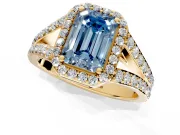Halo Engagement Ring Setting for Fancy Blue Emerald Cut Center with Narrow Pave Split Shank and Prong Head in Yellow Gold