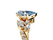 Solitaire Engagement Ring Setting for Fancy Blue Pear-Shaped Center with Marquise Accent Twist Band and Prong Head in Yellow Gold