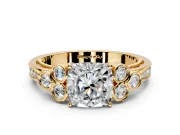 Cluster Engagement Ring Setting for Cushion Cut Center with Bezel Accent Clusters and Prong Head in Yellow Gold