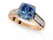Solitaire Engagement Ring Setting for Fancy Blue Cushion Cut Center with Round Cut Channel Band and Prong Head in Rose Gold
