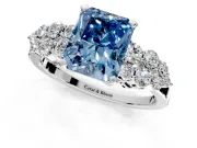 Cluster Engagement Ring Setting for Fancy Blue Radiant Cut Center with 2-Row Shoulder Clusters and Prong Head in Platinum