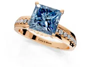 Solitaire Engagement Ring Setting for Fancy Blue Princess Cut Center with Raised Channel Band and Prong Head in Rose Gold