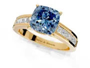 Solitaire Engagement Ring Setting for Fancy Blue Cushion Cut Center with Princess Cut Channel Band and Prong Head in Yellow Gold