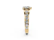 Solitaire Engagement Ring Setting for Pear-Shaped Center with Graduated Shared Prongs and Prong Head in Yellow Gold
