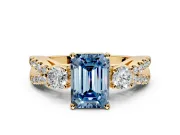 3 Stone Engagement Ring Setting for Fancy Blue Emerald Cut Center with Pave Split Shank and Prong Head in Yellow Gold