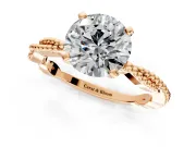 Solitaire Engagement Ring Setting for Round Cut Center with Twist Band and Bead Prong Head in Rose Gold