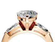 3 Stone Engagement Ring Setting for Heart-Shaped Center with Tapered Baguettes, Plain Band and Prong Head in Rose Gold