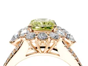 Halo Engagement Ring Setting for Fancy Yellow Radiant Cut Center with Two-Strand Split Shank and Prong Head in Rose Gold