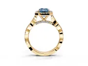 Halo Engagement Ring Setting for Fancy Blue Emerald Cut Center with Twist Band and Prong Head in Yellow Gold