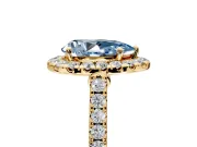 Halo Engagement Ring Setting for Fancy Blue Pear-Shaped Center with Narrowing Pave Band and Prong Head in Yellow Gold
