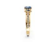 Solitaire Engagement Ring Setting for Fancy Blue Cushion Cut Center with Raised Channel Band and Prong Head in Yellow Gold