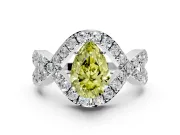 Halo Engagement Ring Setting for Fancy Yellow Pear-Shaped Center with Pave Infinity Twist Band and Prong Head in White Gold