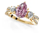 3 Stone Engagement Ring Setting for Fancy Pink Pear-Shaped Center with Pave Split Shank and Prong Head in Yellow Gold
