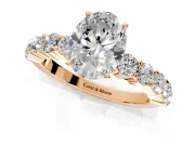 Shared-Prong Engagement Ring Setting for Oval Center with Graduated Accents and Prong Head in Rose Gold