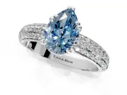 Solitaire Engagement Ring Setting for Fancy Blue Pear-Shaped Center with Multi-Row Pave Accents and Basket Head in Platinum