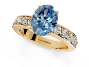 Solitaire Engagement Ring Setting for Fancy Blue Oval Center with Channel-Set Accents and Prong Head in Yellow Gold