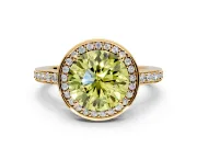 Halo Engagement Ring Setting for Fancy Yellow Round Cut Center with Metal-Rimmed Halo, Pave Band and Prong Head in Yellow Gold