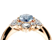 Small-Accent Cluster Halo Engagement Ring Setting for Fancy Blue Pear-Shaped Center with Plain Band and Prong Head in Rose Gold