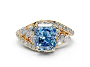 Halo Engagement Ring Setting for Fancy Blue Radiant Cut Center with Marquise and Pave Bypass Band and Prong Head in Yellow Gold
