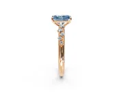 Cluster Engagement Ring Setting for Fancy Blue Radiant Cut Center with Round Cut Accent Band and Prong Head in Rose Gold