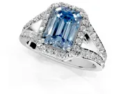 Halo Engagement Ring Setting for Fancy Blue Emerald Cut Center with Narrow Pave Split Shank and Prong Head in Platinum