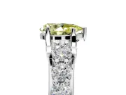 Solitaire Engagement Ring Setting for Fancy Yellow Pear-Shaped Center with Graduated Shared Prongs and Prong Head in Platinum