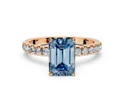 Open Basket Engagement Ring Setting for Fancy Blue Emerald Cut Center with Pave Band and Prong Head in Rose Gold