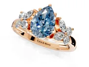 Floral Engagement Ring Setting for Fancy Blue Pear-Shaped Center with Marquise Cluster Shoulders and Prong Head in Rose Gold